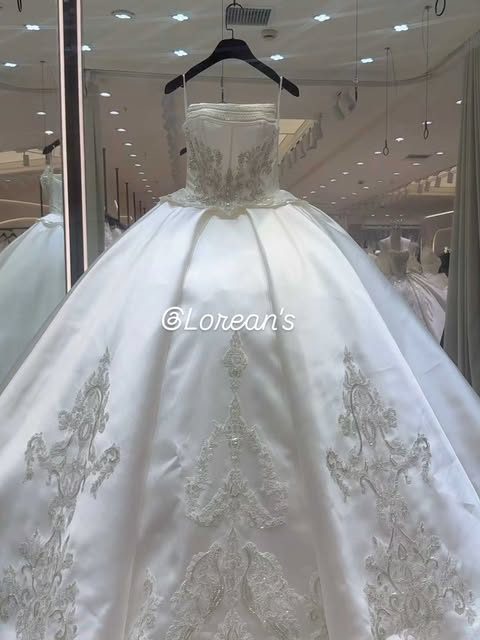 Embroidered satin gown