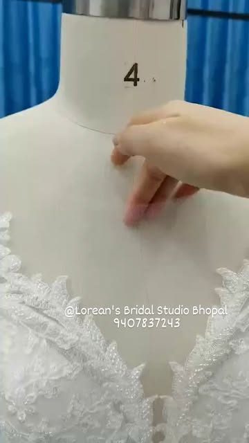 Gown being fitted on a dress form